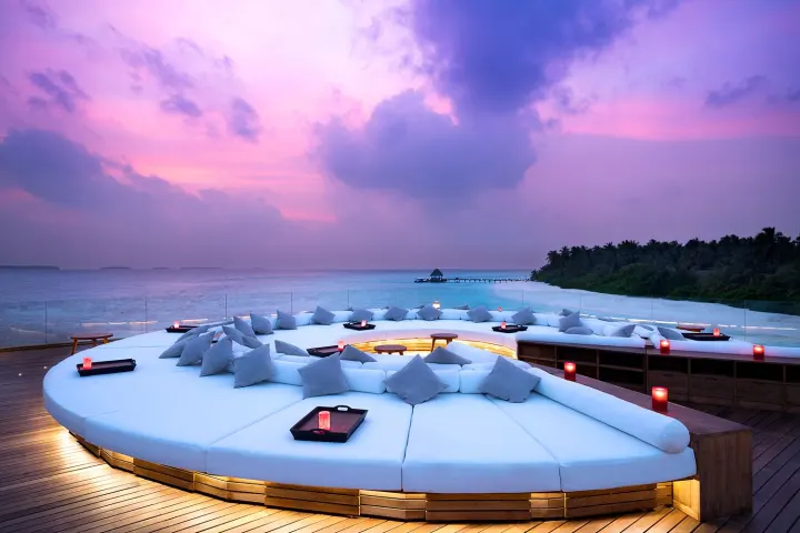 Anantara Kihavah Maldives Villas, Мальдивы — бар Anantara Kihavah Maldives Villas — бар на крыше на закате