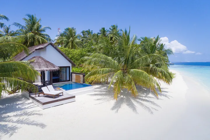 Bandos Maldives — ванная комната с большой круглой ванной