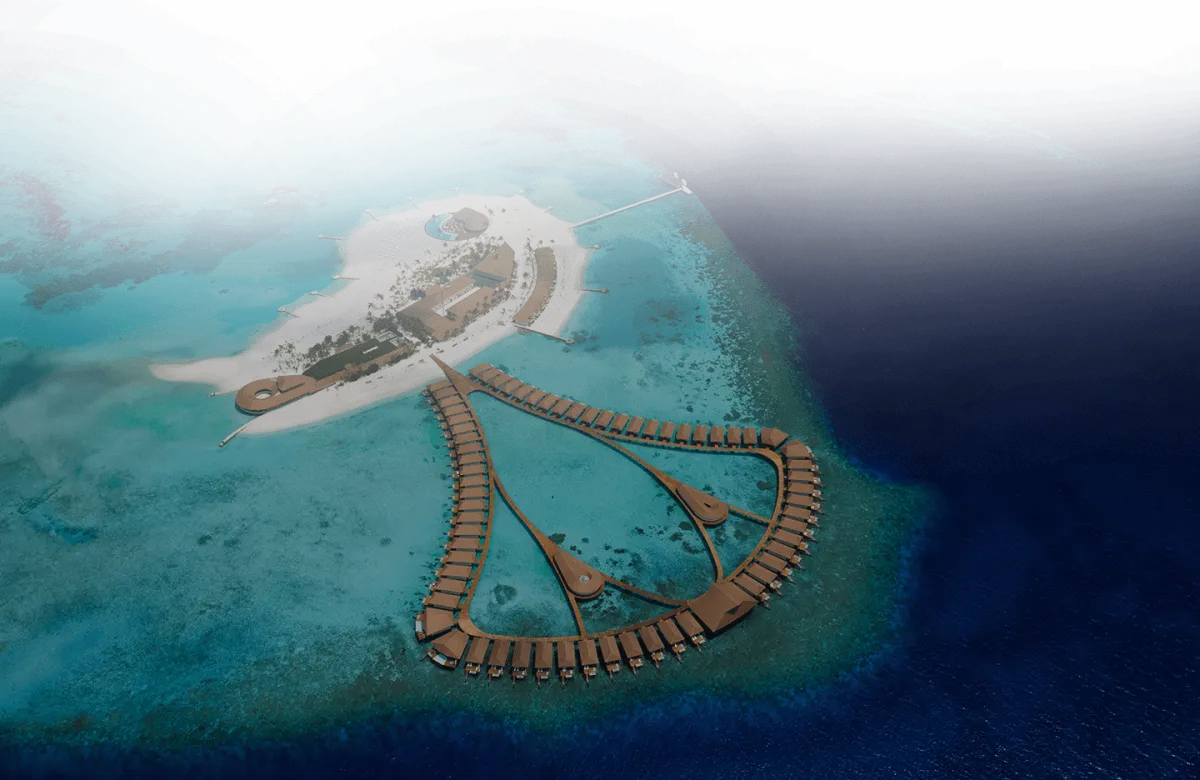 Cinnamon Velifushi Maldives — вид сверху на зеленый остров и водные виллы