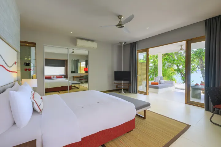 Dhigali Maldives — интерьер спальни