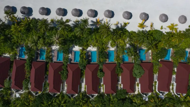Dhigufaru Island Resort, Мальдивы — вид сверху Dhigufaru Island Resort — пляжные виллы с бассейнами с высоты