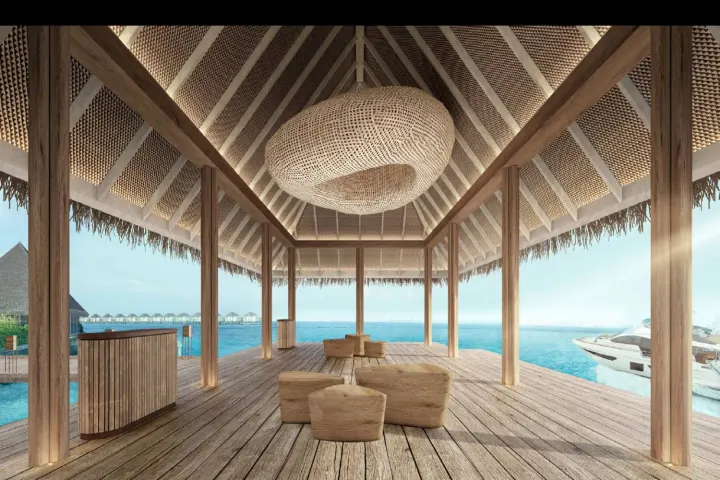 dusitD2 Feydhoo Maldives — причал прибытия гостей с павильоном встречи над прозрачной водой