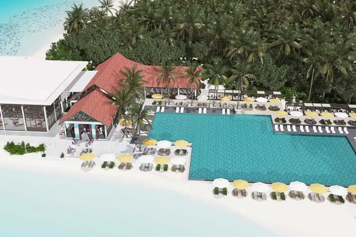 Oblu Xperience Ailafushi — большой прямоугольный бассейн на берегу пляжа