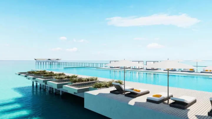 Royal Island Resort & Spa (Villa Haven), Мальдивы — прибытие Royal Island Resort & Spa (Villa Haven) — деревянный павильон на воде с длинным пирсом на закате