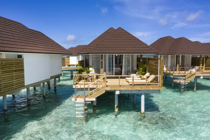 Sun Siyam Olhuveli, Мальдивы — вилла на воде Sun Siyam Olhuveli — виллы на воде над прозрачной лагуной